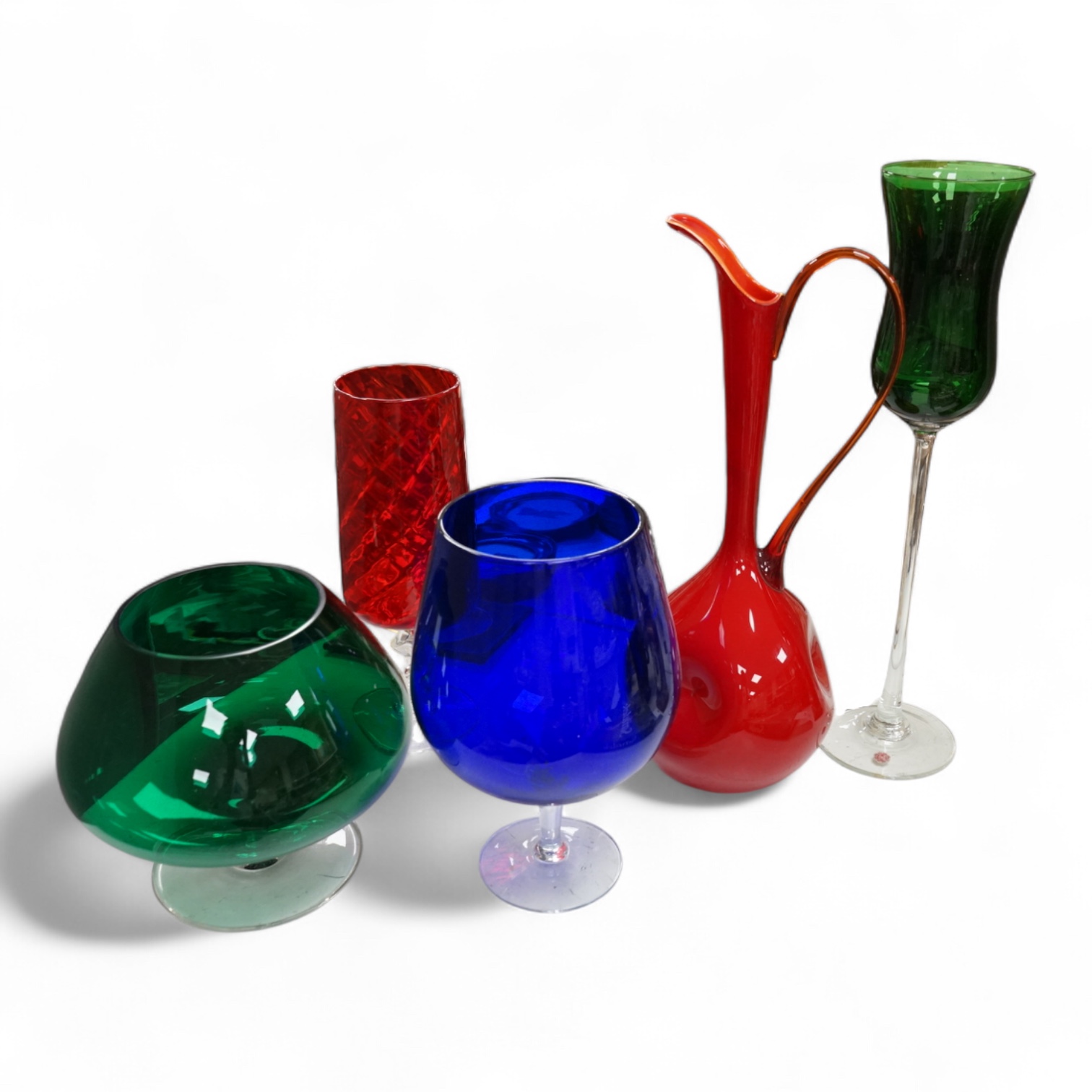 Five pieces of mid-century coloured glassware, to include a jug and an oversized brandy balloon, largest 48cm high